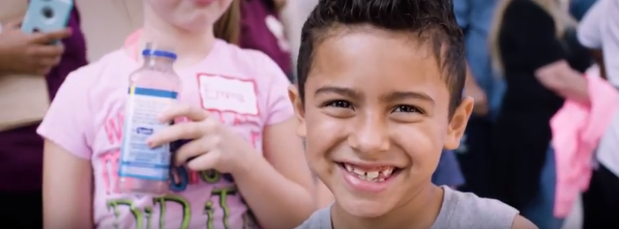 Photo: Child smiling.