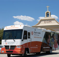 Mobile Wellness clinic bus in front of church