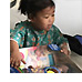 A young patient at St. Rose Dominican's receives a gift